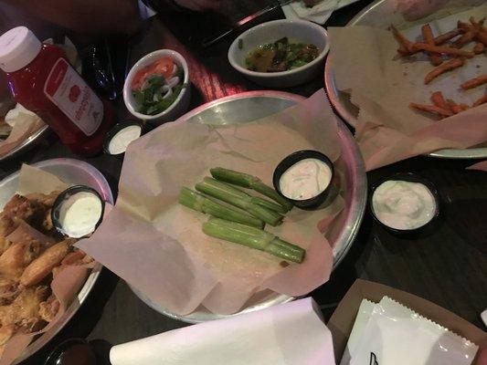 5 Sticks (I ate one) for an order of 50 wings.