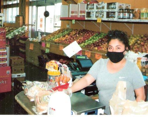 Paola, checking out groceries at Farmer's Produce, 459 E. Railway Ave., Paterson, NJ