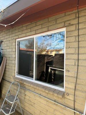 Energy efficiency vinyl window after replaced from aluminum frame