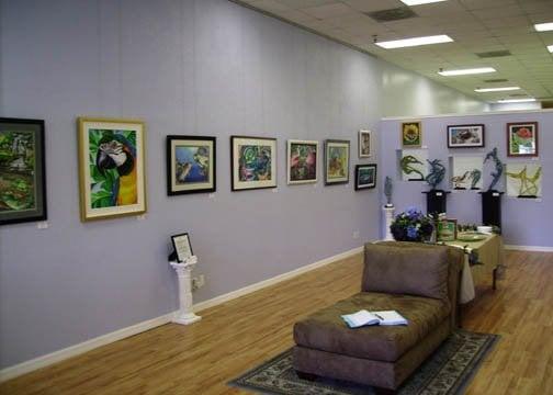 Main gallery featuring professional artists in monthly exhibitions.