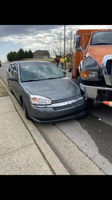 This picture says it all. They obviously didn't see her when they changed lanes.