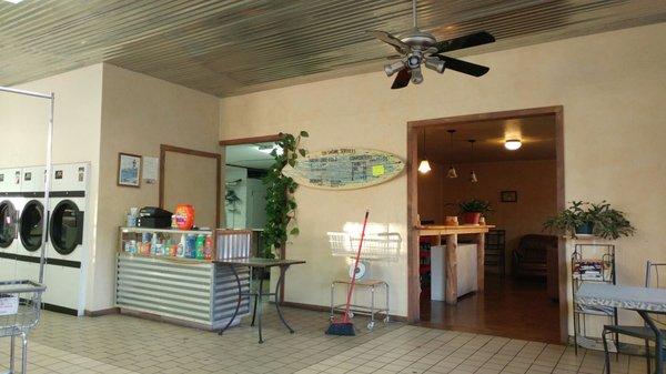 The service counter with rates. They also change bills for quarters at the desk.