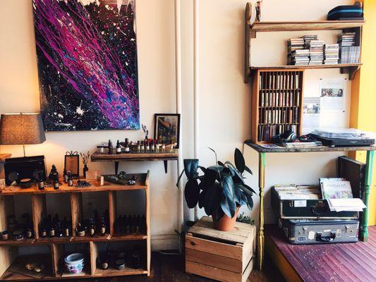 Local art on the walls, listening station and essential oils.