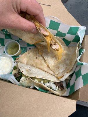 Chicken quesadilla and a carne asada taco.