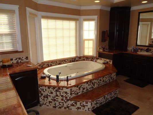 Major bathroom remodel addition into an existing balcony. Most of the finish interior touches done well by ADC.