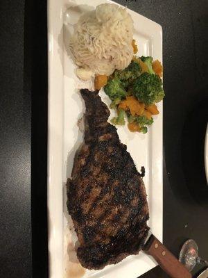 Delmonico steak with red skin mashed potatoes and vegetables