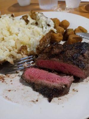 Sirloin steak a perfect medium. Baked potato and fried okra were good as well.