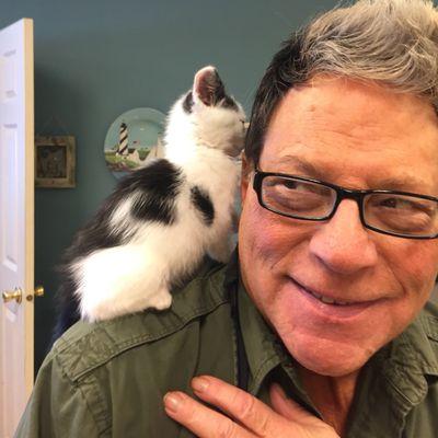 Stylist Bill assisted by company mascot Rumpel