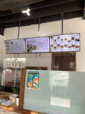 Front of restaurant and display of menus