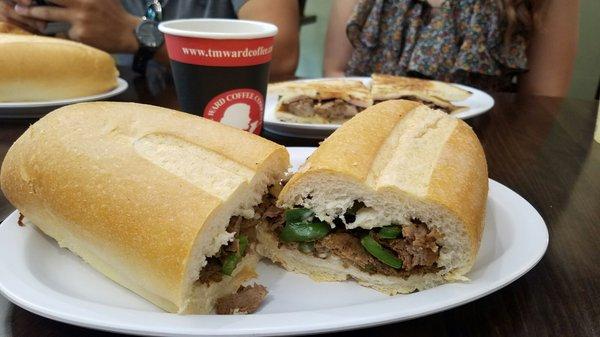 Philly cheese steak, Cuban panini, and coffee.