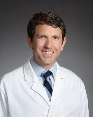 Dr. Adam J. Huddleston