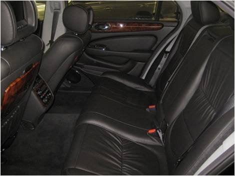 Jaguar VP interior. Stretched for more leg room. Rear entertainment controls. Headrest monitors.