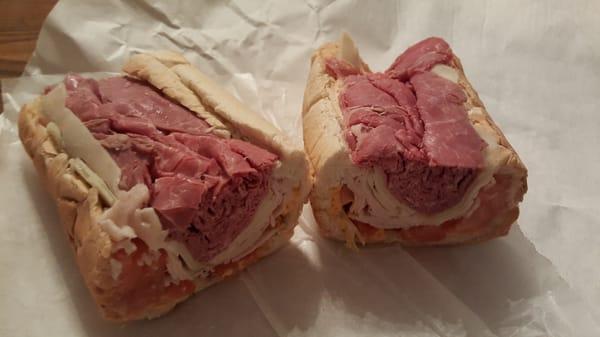 "The Big boy" small sub, which was actually too big to finish & so good! Turkey, pastrami, cheese, tomatoes & Russian dressing.