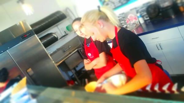 Stirring the mixins into the premium creme