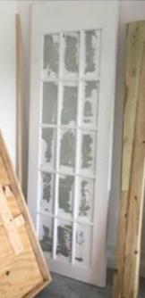 The door at it's original state. As you can see, no door nob which means never was used.