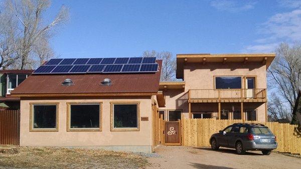 View from the street. The building envelopes were constructed using Faswall by Shelterworks.