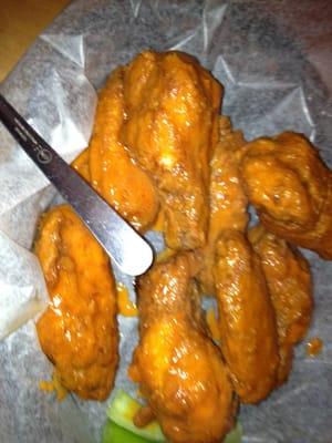 Buffalo Wings. Available breaded as shown or naked. Other sauces as well.