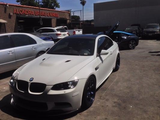 Mini detail with an I8 chillin in the background