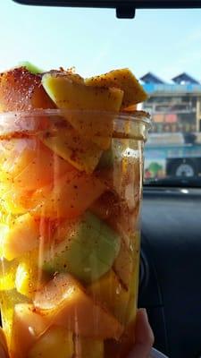 Had my cup full of cantaloupe, cucumber, mango, and pineapple. Topped off with Tajin y limon.