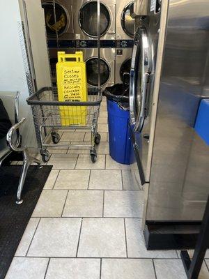 6:30 the boy starts cleaning and limits access to the machines