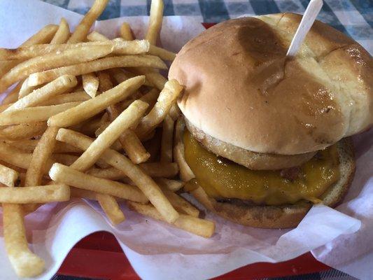 Juicy Western Bacon Cheeseburger topped with an Onion Ring and side of Fries