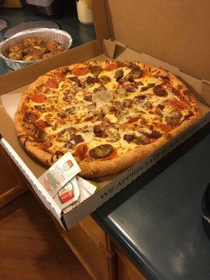 Pizza with salami, pepperoni and Italian sausage delicious