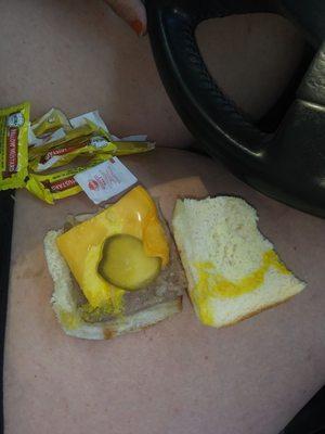 Un melted cheese hard corner cold food from bottom of box