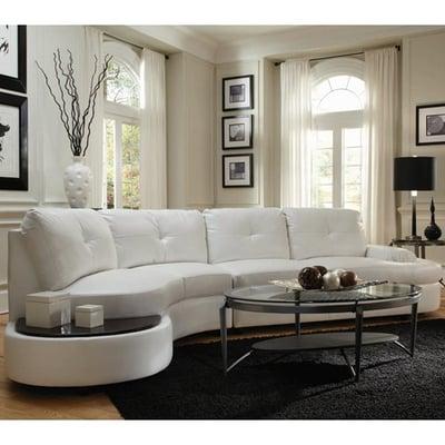 Simple and Sleek Modern sectional with built in table with black top perfect piece for the Modern Glamour Feel. Lease or
Buy