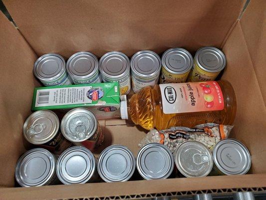 Corn, chili milk, juice, 2 more bags of beans fit in the gap, then a box of cereal on top