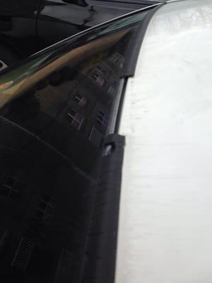 Before Picture: Weather stripping at the top of my winshield that needed repair.