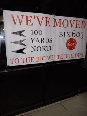 Big sign saying they moved next door
