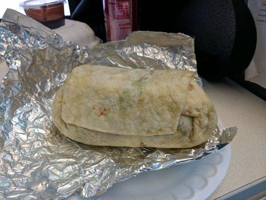 ground beef, white rice, black beans, refried beans, nacho cheese, pico de gallo, mild sauce, sour cream, corn salsa, and shredded lettuce.