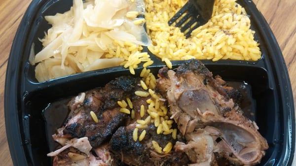 Jerk Chicken is pretty decent. Yellow rice and cabbage isn't bad either!