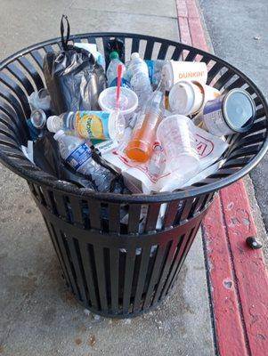 Overflowing trash cans