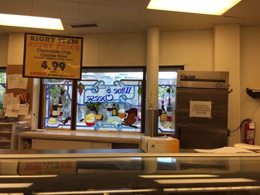 Stained-glass window facing Cedar Road at Dave's Market, Cedar/Fairmount.