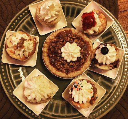 All 6 mini cheesecakes and a pecan pie