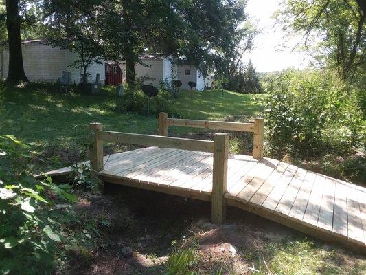 Recent project. Building a small bridge. I also build decks, fences, painting, drywall, someflooring, siding, and more.