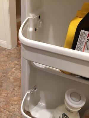 Screws to hold two very different shelving crossbars onto the door that weren't made for the model fridge.