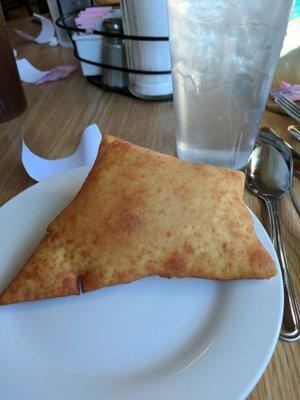 Hatchas sopapillas with honey.