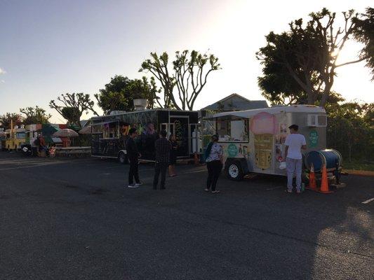 At the end of the line of food trucks