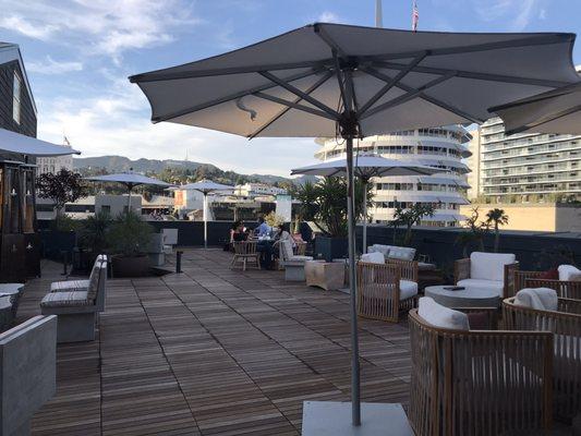 Lounge side of the rooftop at h Club LA