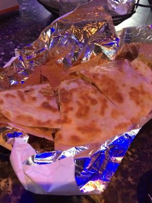 Chicken quesadilla. First one had beans on it? Weird. But then we got a correct one.