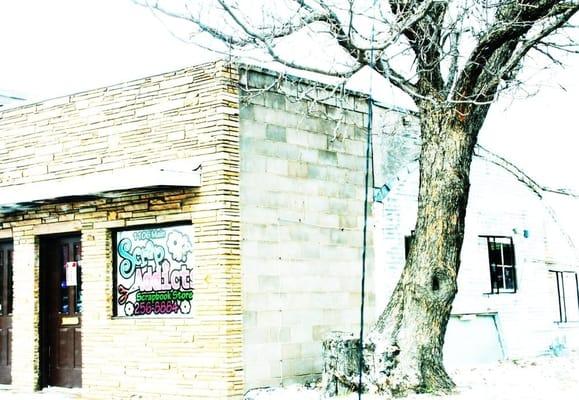 Scrap Addicts. Strorefront integrated into Quonset Hut structure.