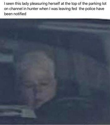 She looks a child porno while driving around in a creeper van acting like she getting money from machine. Plate of vehicle is 80305h3