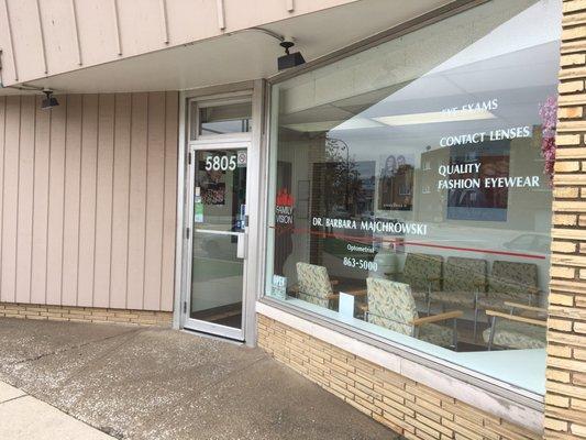 Front door. Parking can be very difficult on Wednesdays.