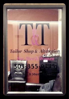 Front door to T&T Tailor Shop, located on the ground floor.