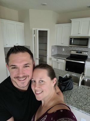 My fiance and I in our new home that we bought with the help of TC Orlando Homes!