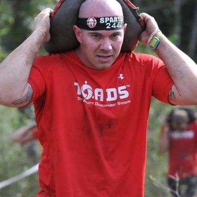 Josh competing in the Spartan Race