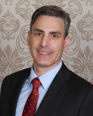 Christopher A Sutton