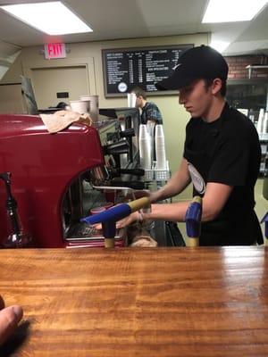 Real baristas making real espresso with real espresso machines.